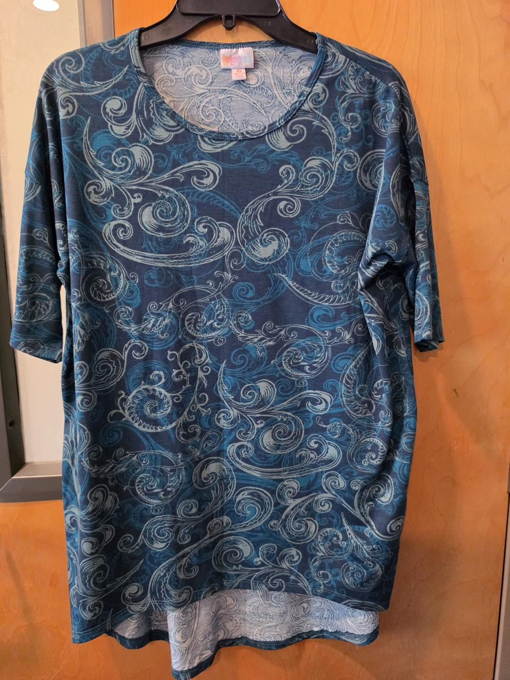 LuLaRoe Teal and Navy Swirl Print Women’s Top